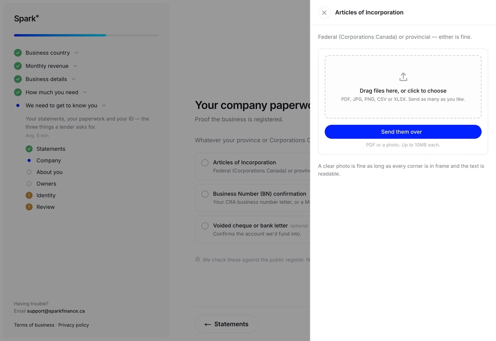 The upload drawer for articles of incorporation, showing the hint about what the document is and a drop zone accepting a PDF or a photo up to ten megabytes.